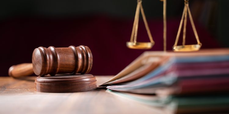 Processi: il divieto a riprese e foto in aula rischiano di minare la corretta informazione. Il sindacato chiede una maggiore disponibilità